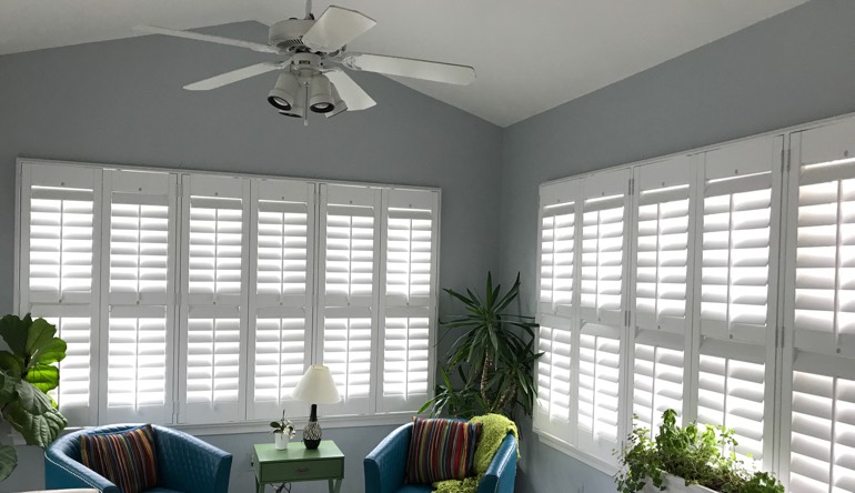 Atlanta living room with fan and shutters